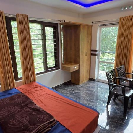 Hn Cottages, Munnar Jāmb Buitenkant foto